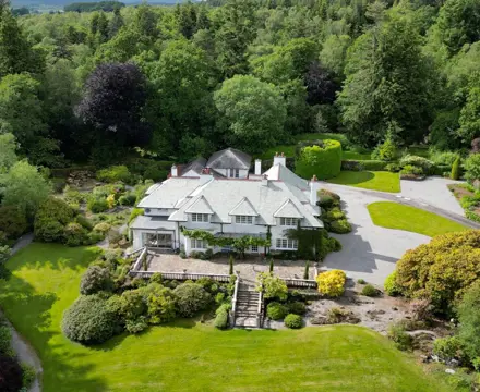 Elegant arts & crafts home with beautiful gardens and tennis court: Whitehills House, Galbraith 1